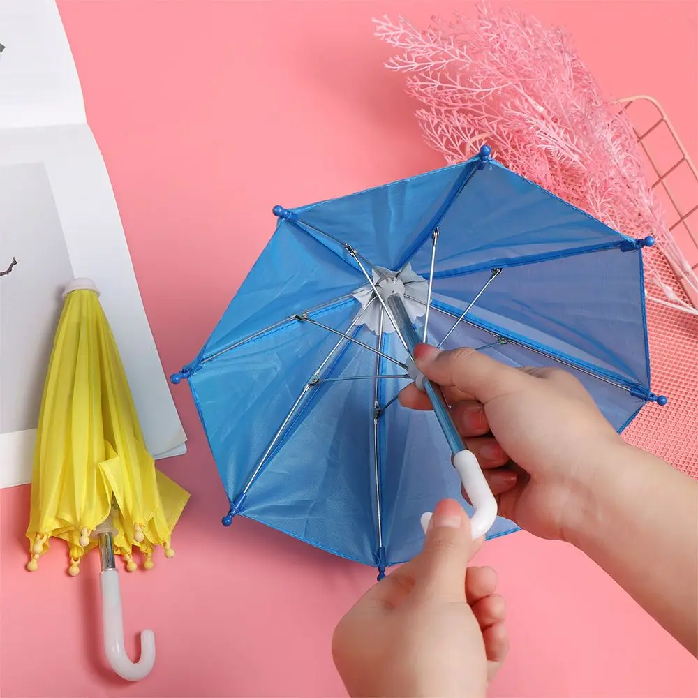 Mini paraguas de juguete para niños, sombrilla de lluvia, accesorios para muñecas, regalo de cumpleaños, adorno de muñeca para niños, nuevo, 1 pieza