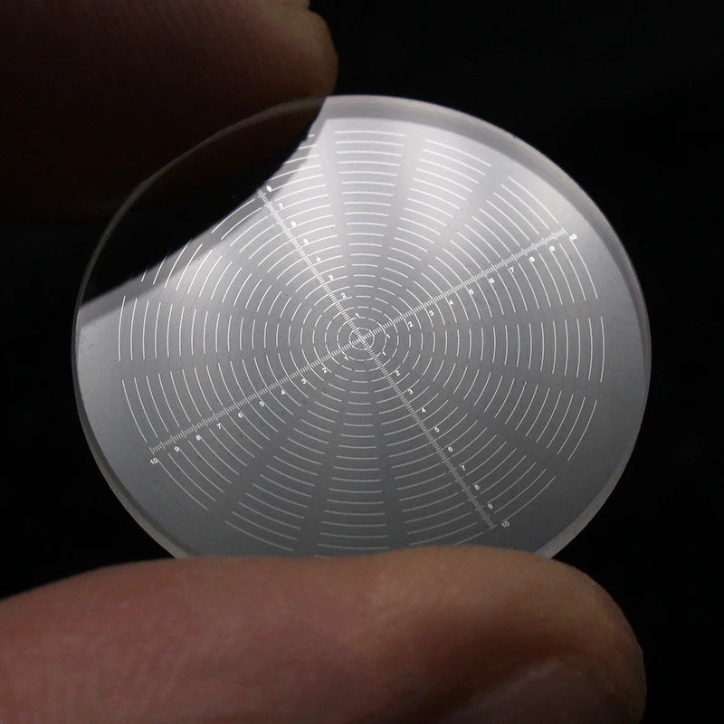 Micrómetro ocular de diámetro de 24mm, regla cruzada de vidrio óptico, anillos de círculos concéntricos de red, aguja para microscopio estéreo de 30 30,5mm