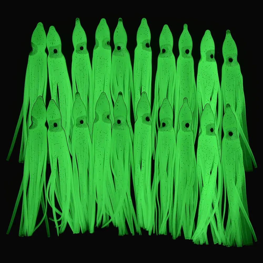 120 Uds faldas de calamar fluorescentes Jig cebo luminoso pulpo señuelos cebo suave agua salada Trolling Señuelos de pesca de fundición 7cm 9cm 11cm