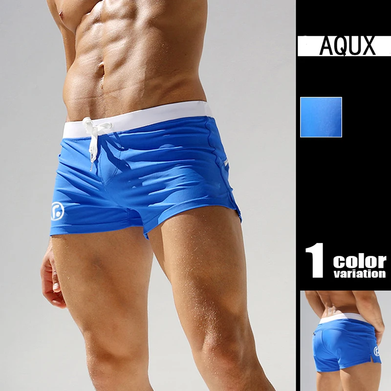 Traje de baño para hombre, pantalón corto de surf de cintura baja, sexy y con personalidad, con bolsillo, para natación y playa