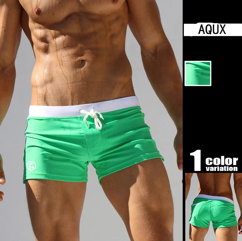 Traje de baño para hombre, pantalón corto de surf de cintura baja, sexy y con personalidad, con bolsillo, para natación y playa