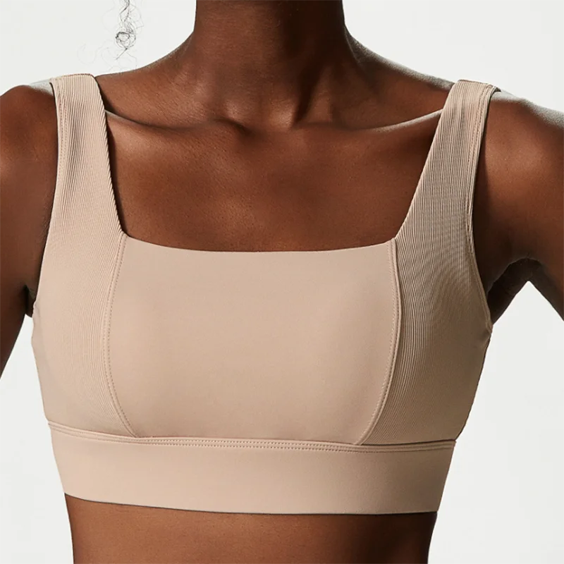 Ropa interior deportiva Sexy para mujer, sujetador de nailon suave transpirable para gimnasio y Yoga, Tops cortos para correr con almohadillas fijas para el pecho, ropa de entrenamiento femenina