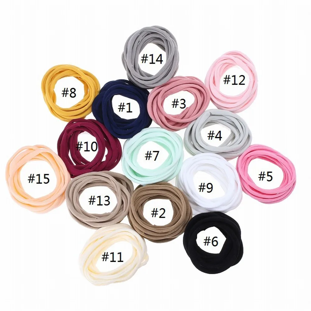 100 unids/lote bebé niña DIY elástico flaco Nylon chica elástico cena suave diadema accesorios para bebé sombreros infantiles artículos para bebé