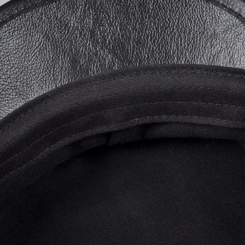 2025 invierno hombres/mujeres sombreros de cuero genuino azul marino Unisex ropa de calle europea/americana gorras negras ajustadas con cinturón Gorro al aire libre