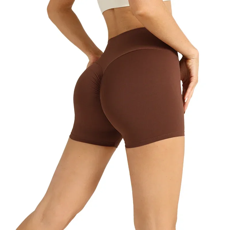 Pantalones cortos de Yoga sin costuras de cintura alta de Color sólido, mallas deportivas transpirables de secado rápido para ciclismo, pantalones cortos deportivos para correr