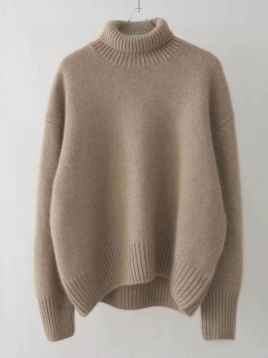 Otoño e Invierno nuevo suéter de lana merina de 100% jersey de punto de cuello alto para mujer tops casuales sueltos de talla grande
