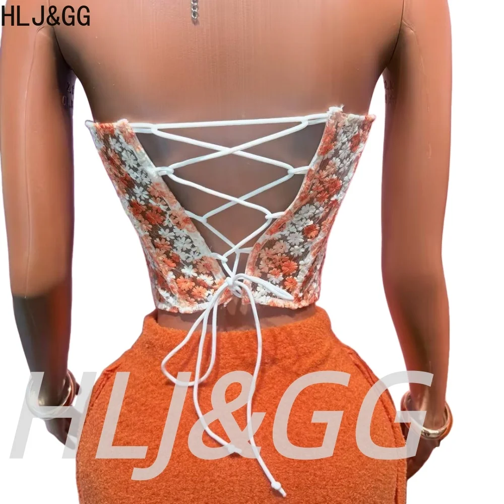 HLJ&GG-Conjunto de dos piezas con corsé bordado de flores y encaje para mujer, Top ajustado con hombros descubiertos y minifaldas con borlas, ropa de calle