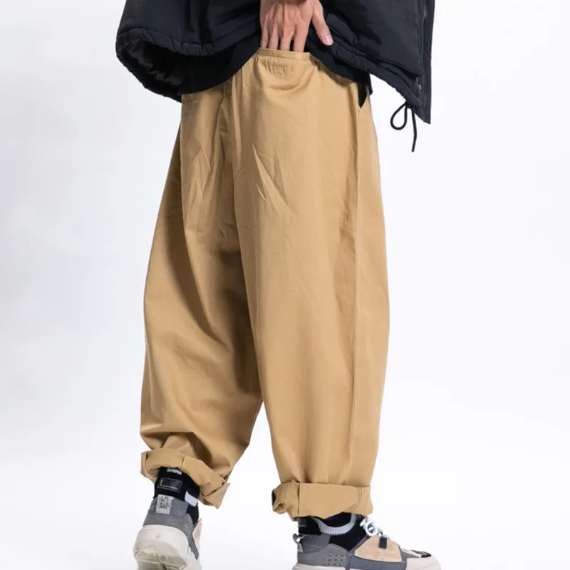 2025 primavera nuevos pantalones casuales Cityboy moda holgada japonesa pantalones de pierna ancha versátiles pantalones de trabajo de Color sólido hombres y mujeres