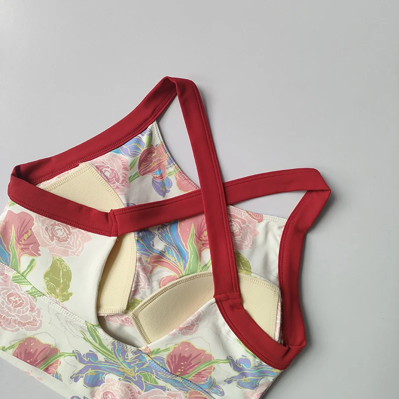 Nueva lencería de Yoga de alta gama para mujer, ropa interior de una pieza con copa fija a prueba de golpes, sujetador con tirantes anchos estampados sexis