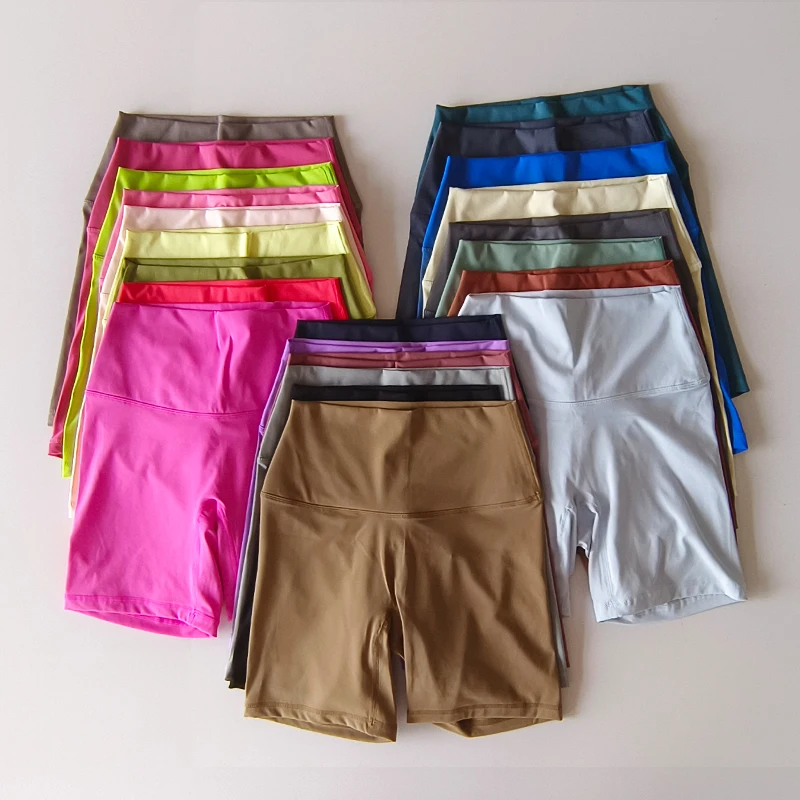 Pantalones cortos deportivos para mujer, pantalones cortos de Yoga de cintura alta, ajustados, levantadores de glúteos, gimnasio, correr, pantalones cortos de nailon de alta elasticidad
