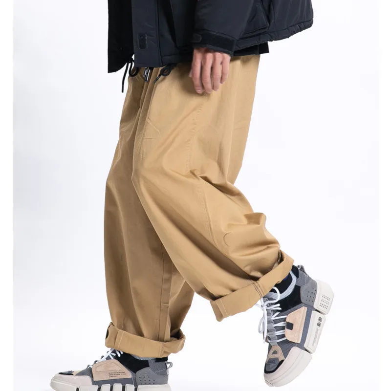 2025 primavera nuevos pantalones casuales Cityboy moda holgada japonesa pantalones de pierna ancha versátiles pantalones de trabajo de Color sólido hombres y mujeres