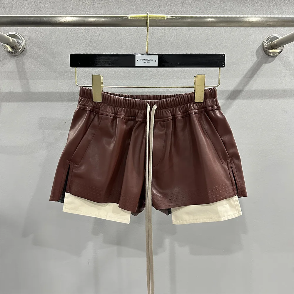 Pantalones cortos cómodos con cuatro bolsillos en las esquinas de cuero PU básico a la moda para mujer nuevos pantalones cortos negros versátiles