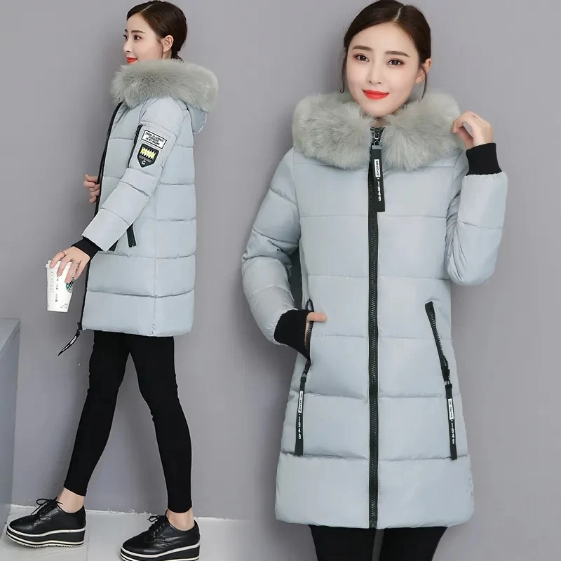 Abrigo de algodón coreano nuevo de invierno 2026 para mujer, chaqueta de longitud media con cuello de piel grande, abrigo grueso y cálido con capucha para mujer