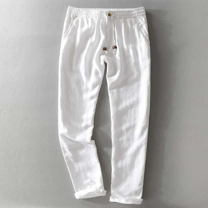 Pantalones de lino para hombre, ropa informal de Color sólido con cuerda de tubo recto, transpirable, novedad