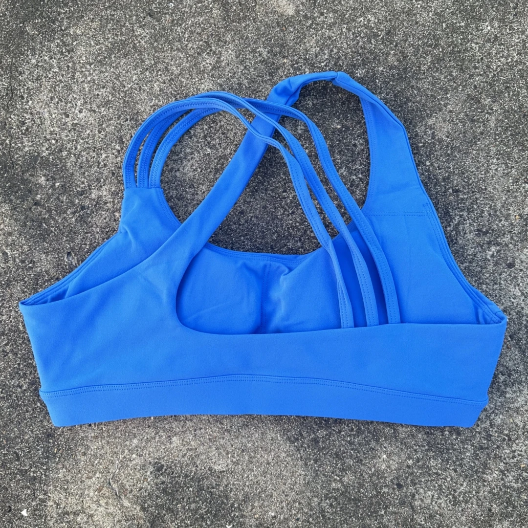 Color sólido de alta resistencia correa cruzada para el hombro gimnasio ropa interior de gimnasio mujeres Fitness deporte sujetador Top a prueba de golpes atlético apretado entrenamiento W