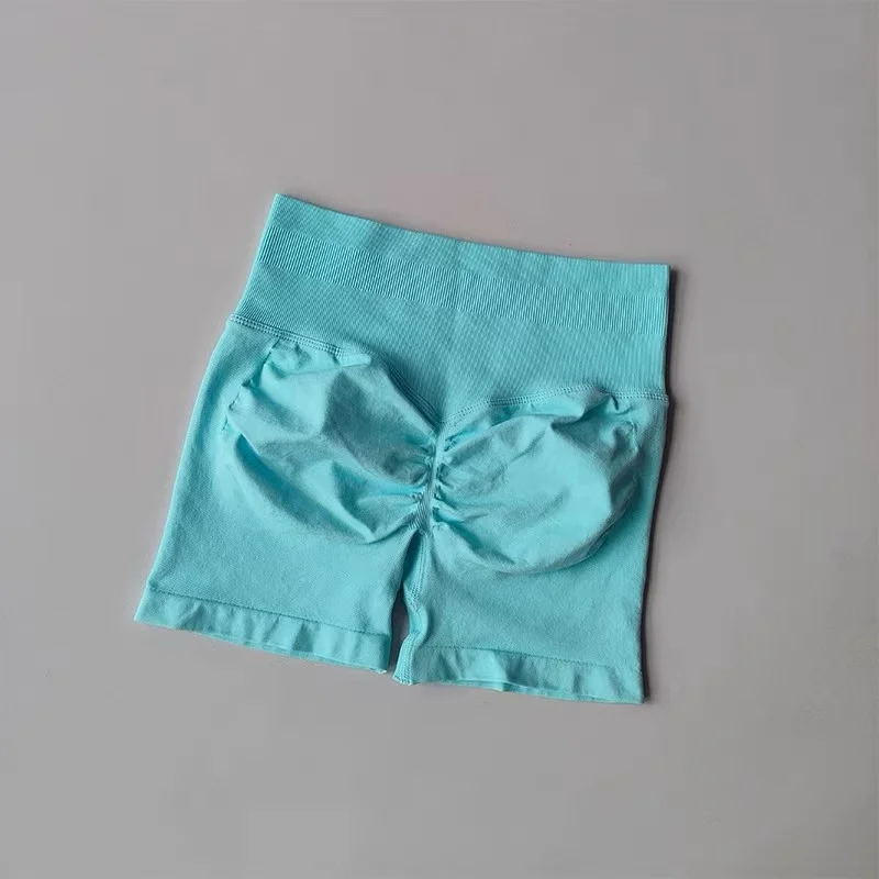 Pantalones cortos deportivos de realce de cadera color melocotón para mujer, cintura alta y ajuste de cintura, adelgazamiento, correr, secado rápido de cadera, pantalones ajustados de tres puntos