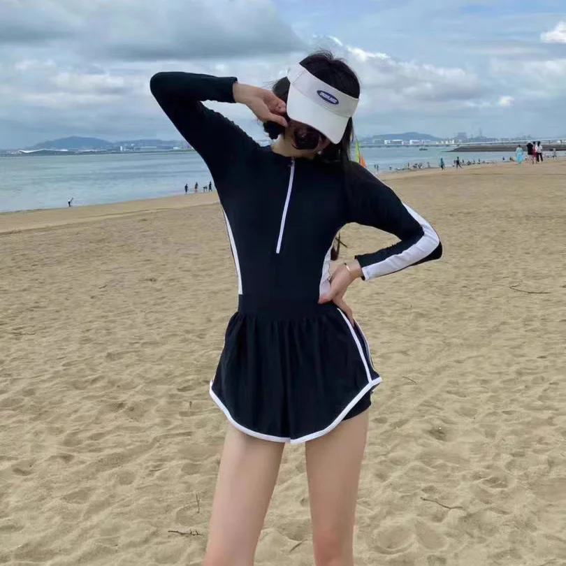 Traje de baño vendedor caliente para mujer, mono de verano de manga larga para niñas, traje de baño sexy de aguas termales, ocultando carne y adelgazar