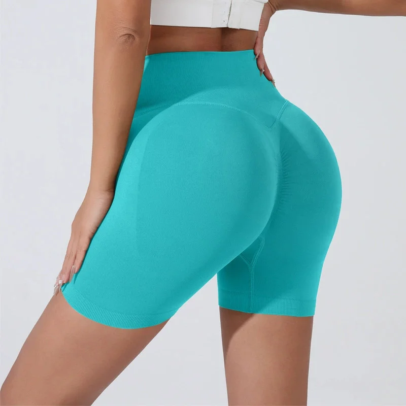 Pantalones cortos deportivos de realce de cadera color melocotón para mujer, pantalones cortos ajustados de tres puntos para adelgazar el vientre, entrenamiento para correr, pantalones de secado rápido