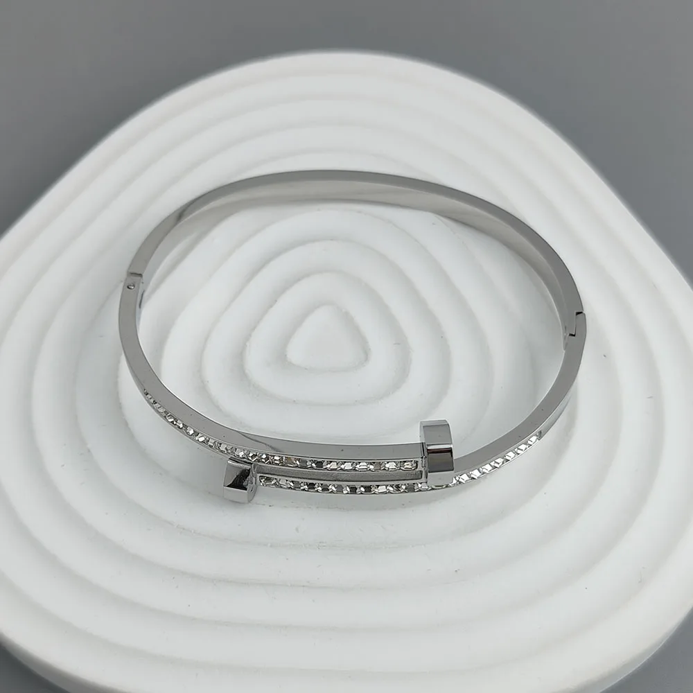 Nueva pulsera chapada en oro de acero inoxidable con circonita para uñas de 18 quilates, pulsera de pareja impermeable de alta calidad, regalo para esposa