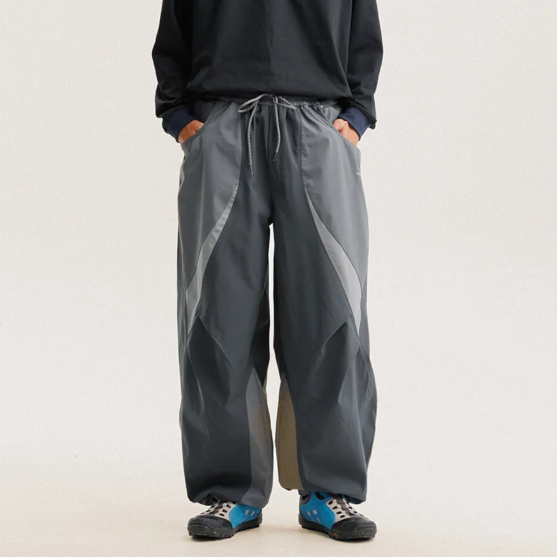 Hombres al aire libre ligero de secado rápido Ultra suelto Casual empalme pierna ancha Techwear pista Cargo pantalones mujeres ropa de calle pantalones holgados