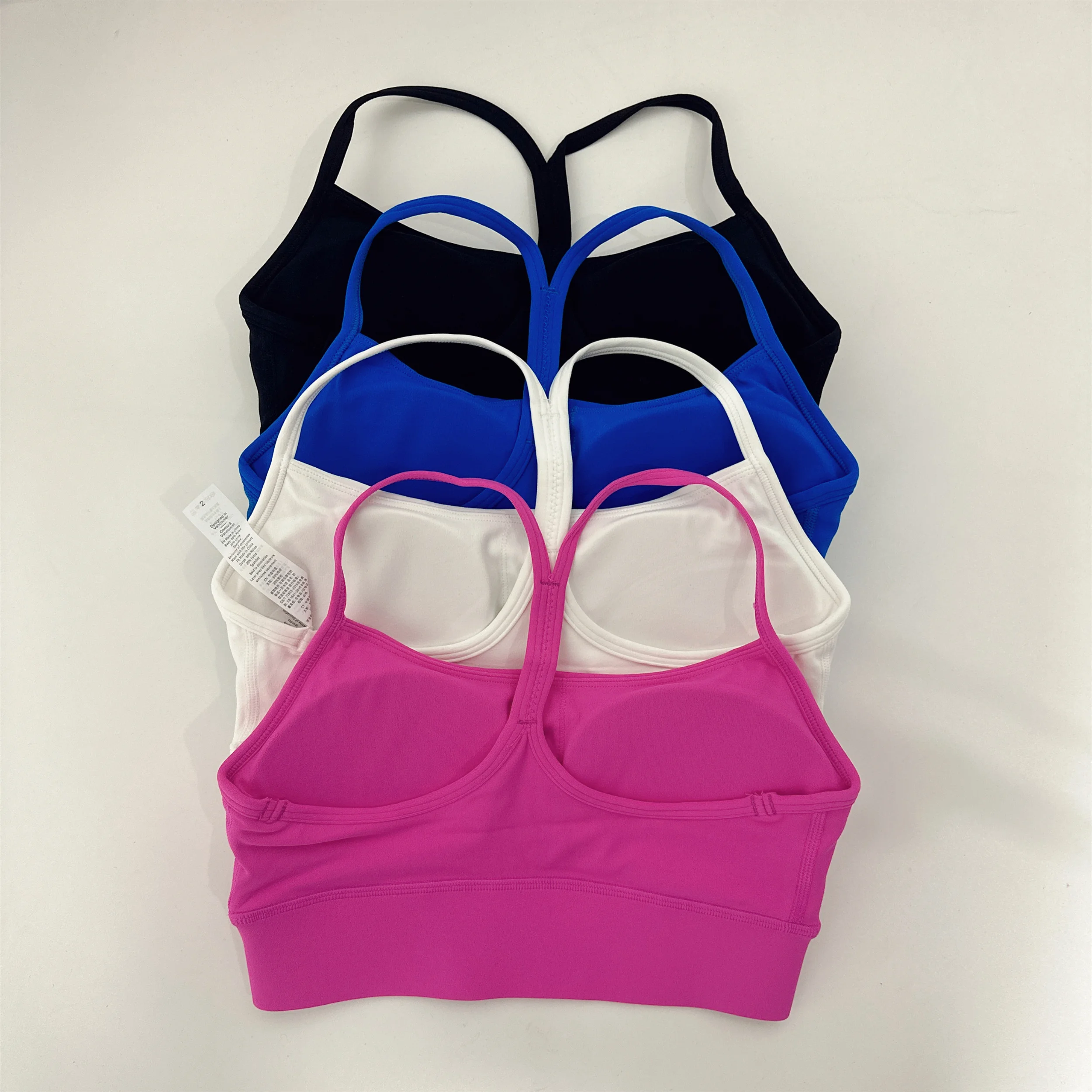 Color sólido suave espalda cruzada forma Y mujeres Fitness sujetador medias Yoga chaleco alta resistencia a prueba de golpes gimnasio deportes Top con almohadilla para el pecho