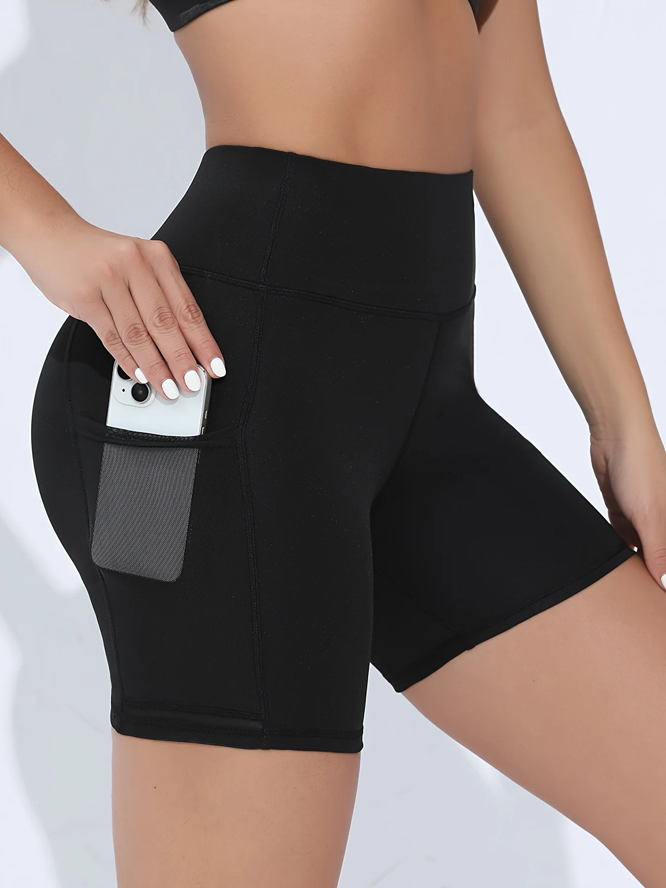Pantalones cortos de yoga de cintura alta de malla con bolsillo Pantalones cortos de ejercicio para mujer