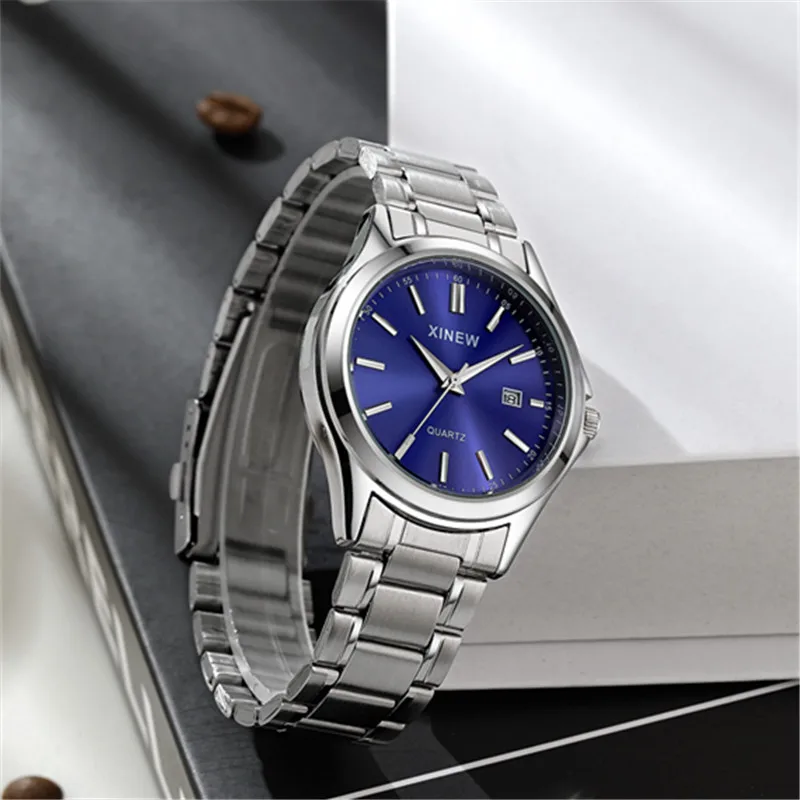 Relojes genuinos de marca XINEW para hombres, moda informal para estudiantes, banda completa de acero inoxidable, reloj de pulsera de cuarzo con fecha Simple, reloj Vintage plateado