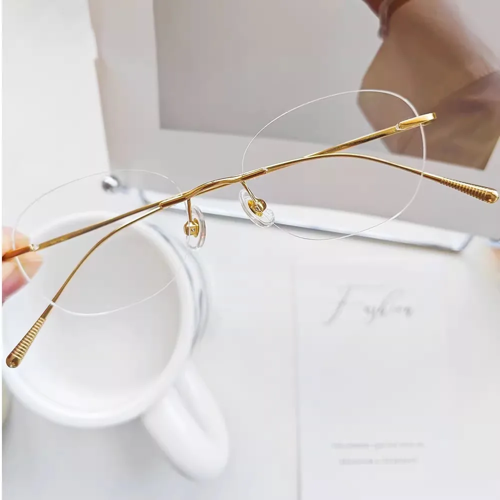 1,61 lentes de mujer, gafas de titanio sin montura con diseño ovalado, gafas doradas graduadas para miopía, 6g, antiluz azul transparente CR39
