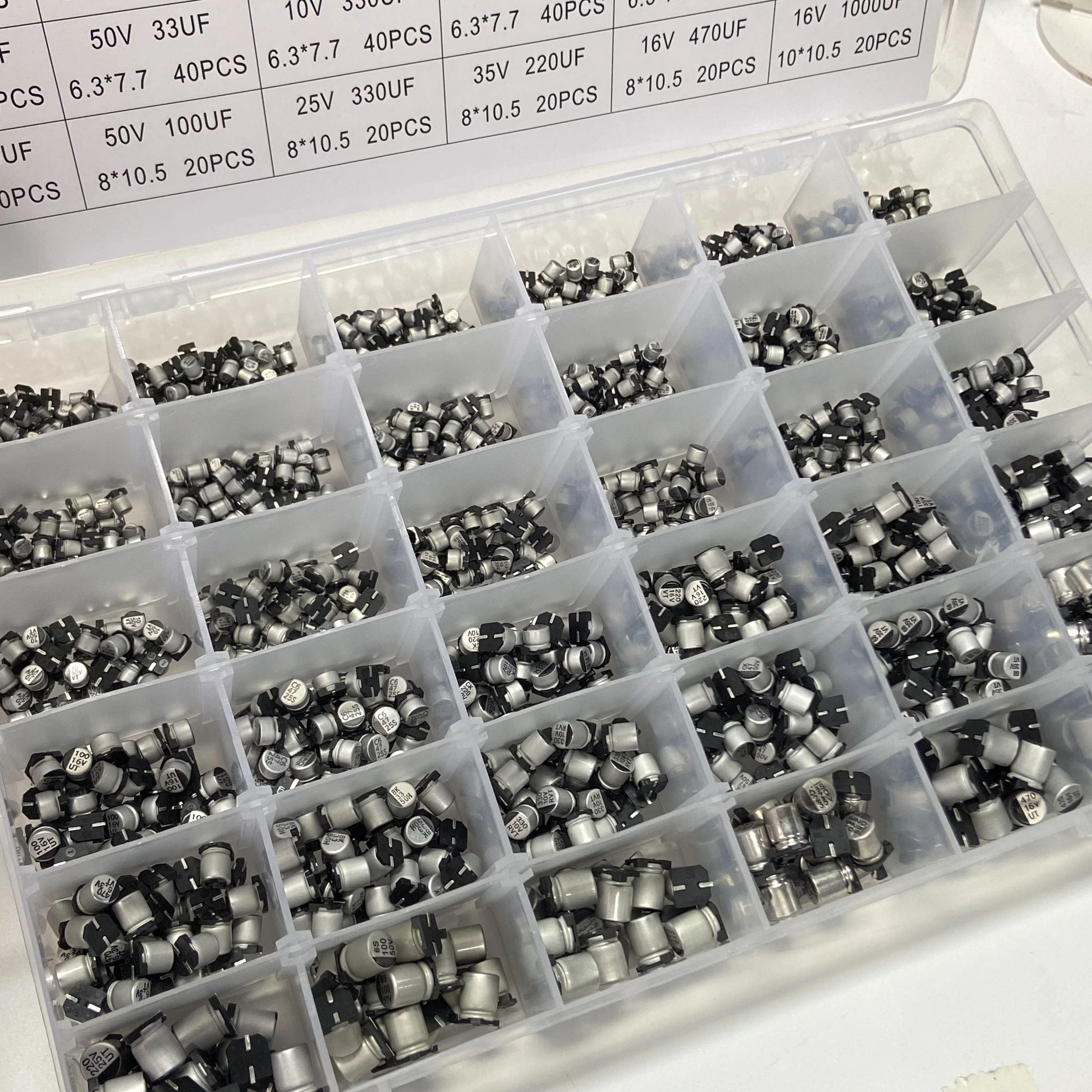 Condensadores electrolíticos de aluminio, Chip SMD de 1500 piezas, caja de muestra de 36 valores, condensadores electrolíticos de aluminio 1UF ~ 1000UF 4V-60V