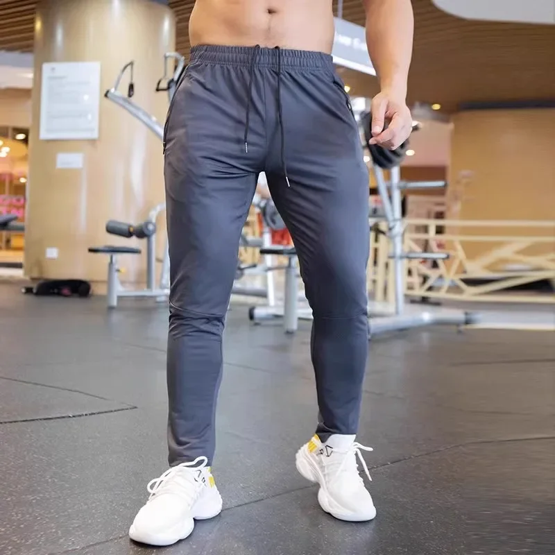 Pantalones Deportivos de Otoño para Hombre, Transpirables, de Spandex, para Correr, Entrenamiento, Gimnasio, Ropa Deportiva Elástica de Secado Rápido, con Bolsillos con Cierre