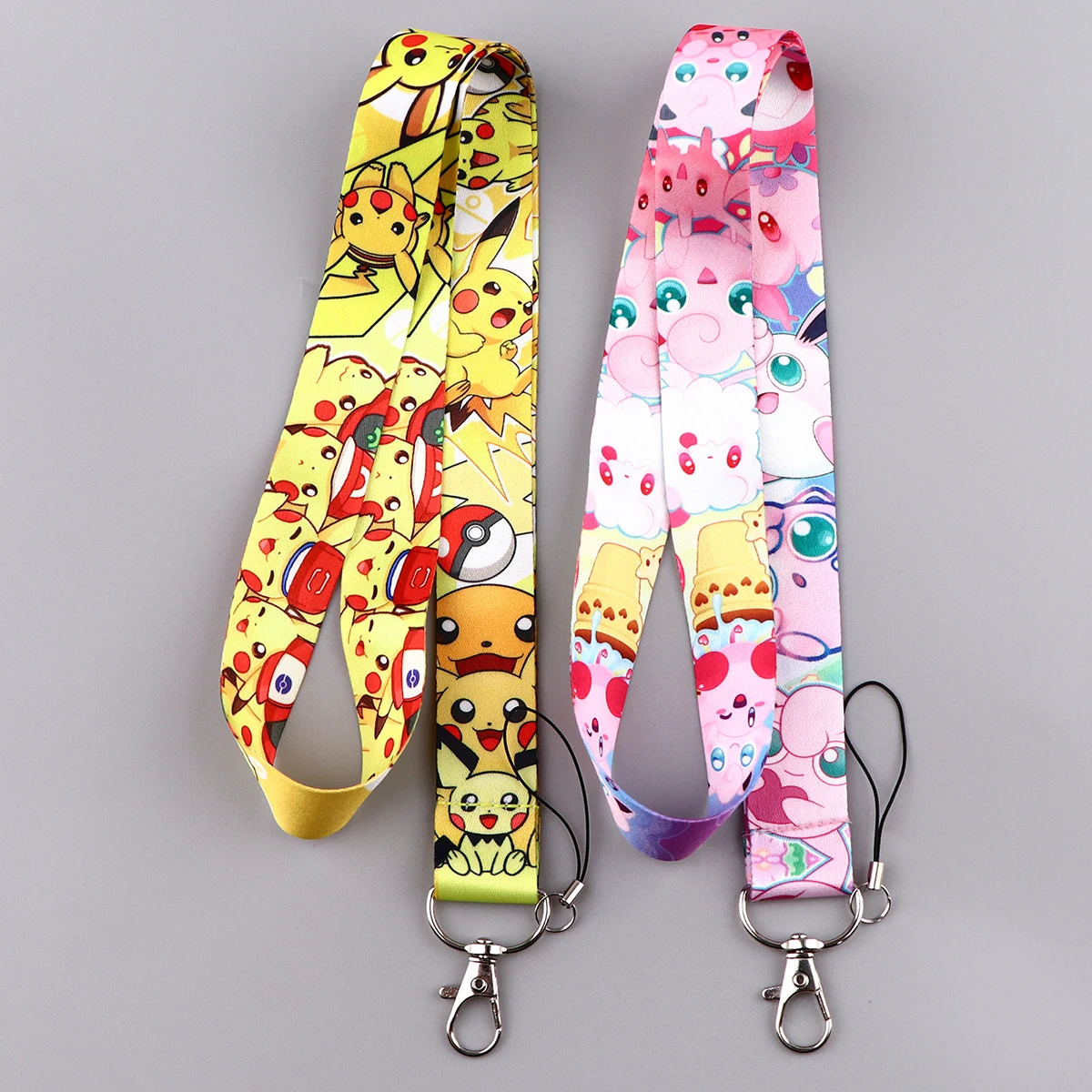 Venta al por mayor, mezcla de 5/10/20 piezas/juego, bonita correa para el cuello con diseño de elfo monstruo de anime, para teléfono, llaves, tarjetas de identificación, accesorios geniales, regalo para amigos