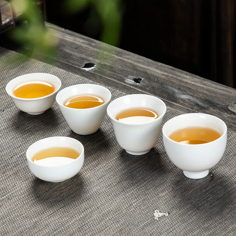 10 unids/pack Dehua porcelana blanca alta taza de té de cerámica blanca pura juego de té de Kungfu hecho a mano juego de tazas de té Pu'er Simple para el hogar