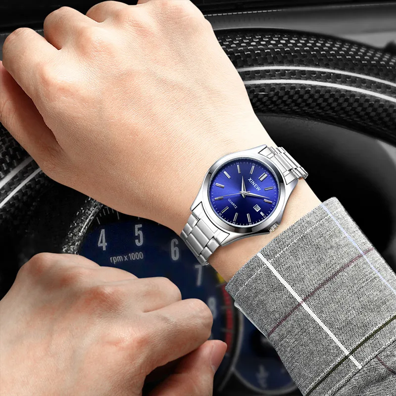 Relojes genuinos de marca XINEW para hombres, moda informal para estudiantes, banda completa de acero inoxidable, reloj de pulsera de cuarzo con fecha Simple, reloj Vintage plateado