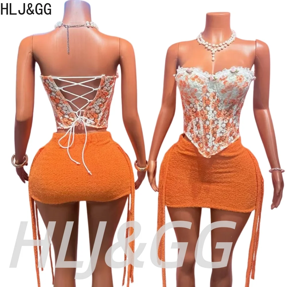 HLJ&GG-Conjunto de dos piezas con corsé bordado de flores y encaje para mujer, Top ajustado con hombros descubiertos y minifaldas con borlas, ropa de calle
