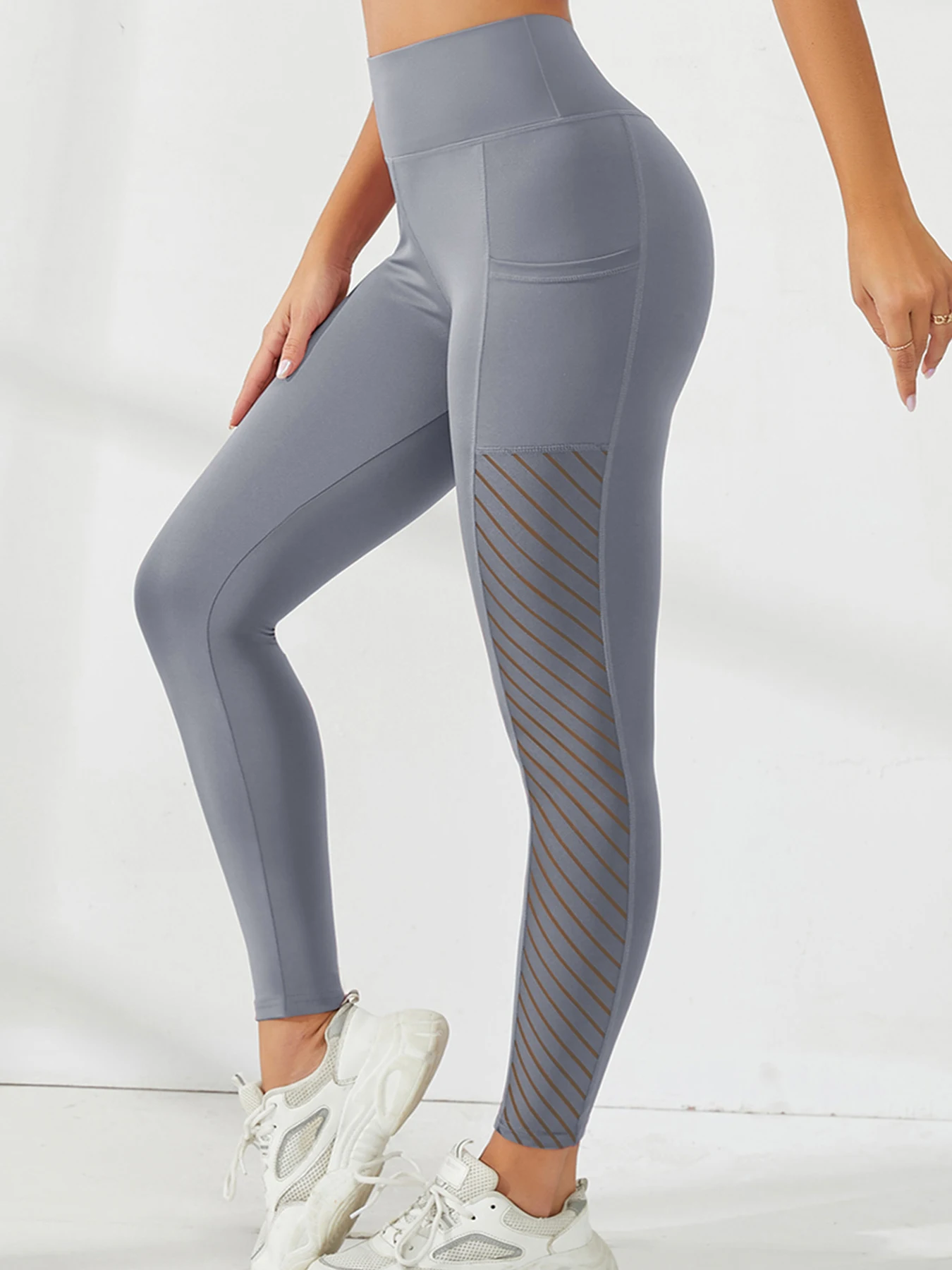 Pantalones de Yoga de cintura alta de malla lateral para mujer, mallas con bolsillos, pantalones hasta el tobillo para entrenamiento con Control de barriga, estilo informal