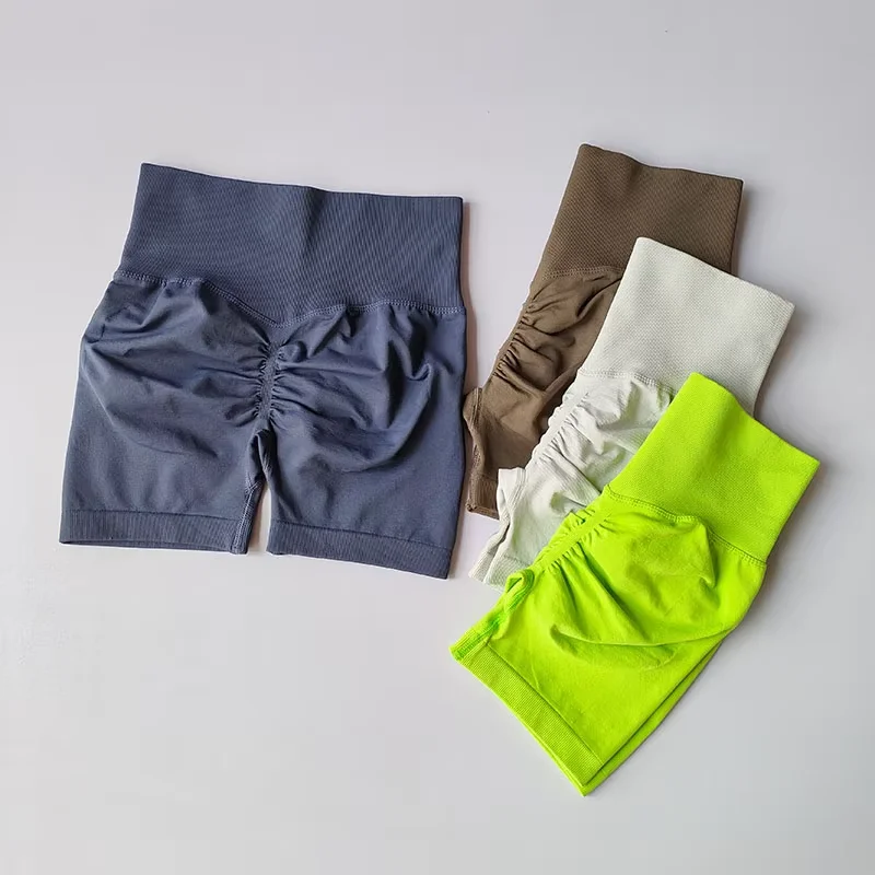 Pantalones cortos deportivos de realce de cadera color melocotón para mujer, cintura alta y ajuste de cintura, adelgazamiento, correr, secado rápido de cadera, pantalones ajustados de tres puntos