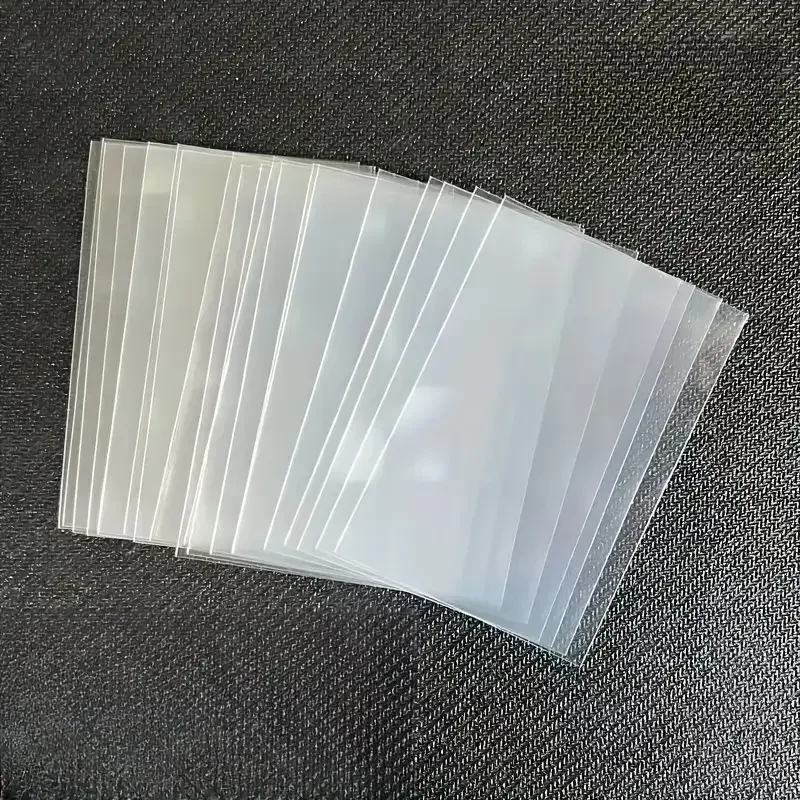 Fundas transparentes para tarjetas de 66x91mm, 100/300 Uds., protector de tarjetas transparente, bolsas de almacenamiento a prueba de arañazos y polvo para tarjetas de juego coleccionables