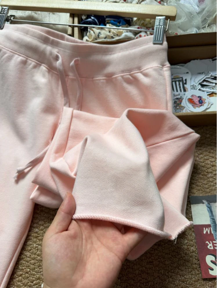 Nuevos pantalones deportivos de algodón rosa claro con cordón para mujer, de cintura baja, corte recto, largos, casuales y versátiles, con dobladillo sin rematar, ideales para primavera.