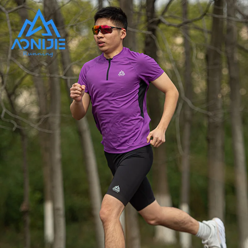 AONIJIE-Camiseta deportiva de secado rápido para hombre, camisa de manga corta con cremallera y cuello redondo, transpirable, para Fitness y ciclismo, FM5158
