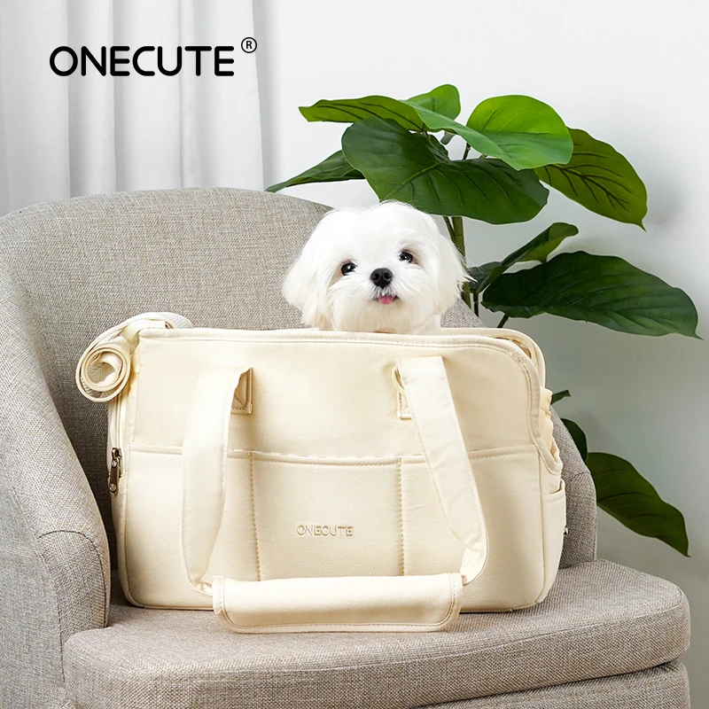 Mascotas Salen de Casa y Llevan a los Cachorros con ellos. Bolsos portátiles de un solo hombro adecuados para transportar gatos y perros pequeños al aire libre, más que los osos.
