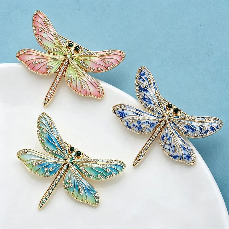 Wuli&baby Hermosos broches de libélula para mujer, unisex, 3 colores, con diamantes de imitación, insectos, broches para fiesta de oficina, regalos