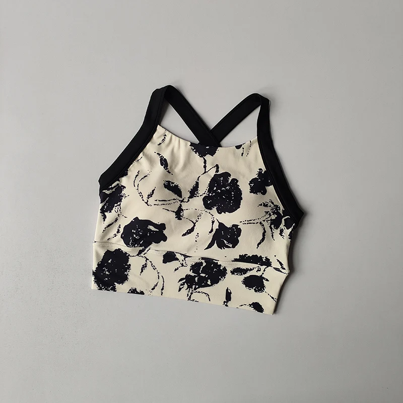 Nueva lencería de Yoga de alta gama para mujer, ropa interior de una pieza con copa fija a prueba de golpes, sujetador con tirantes anchos estampados sexis