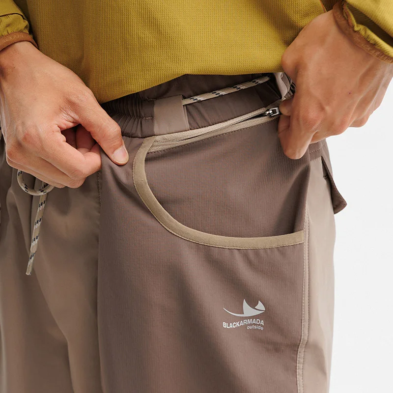 Hombres al aire libre ligero de secado rápido Ultra suelto Casual empalme pierna ancha Techwear pista Cargo pantalones mujeres ropa de calle pantalones holgados