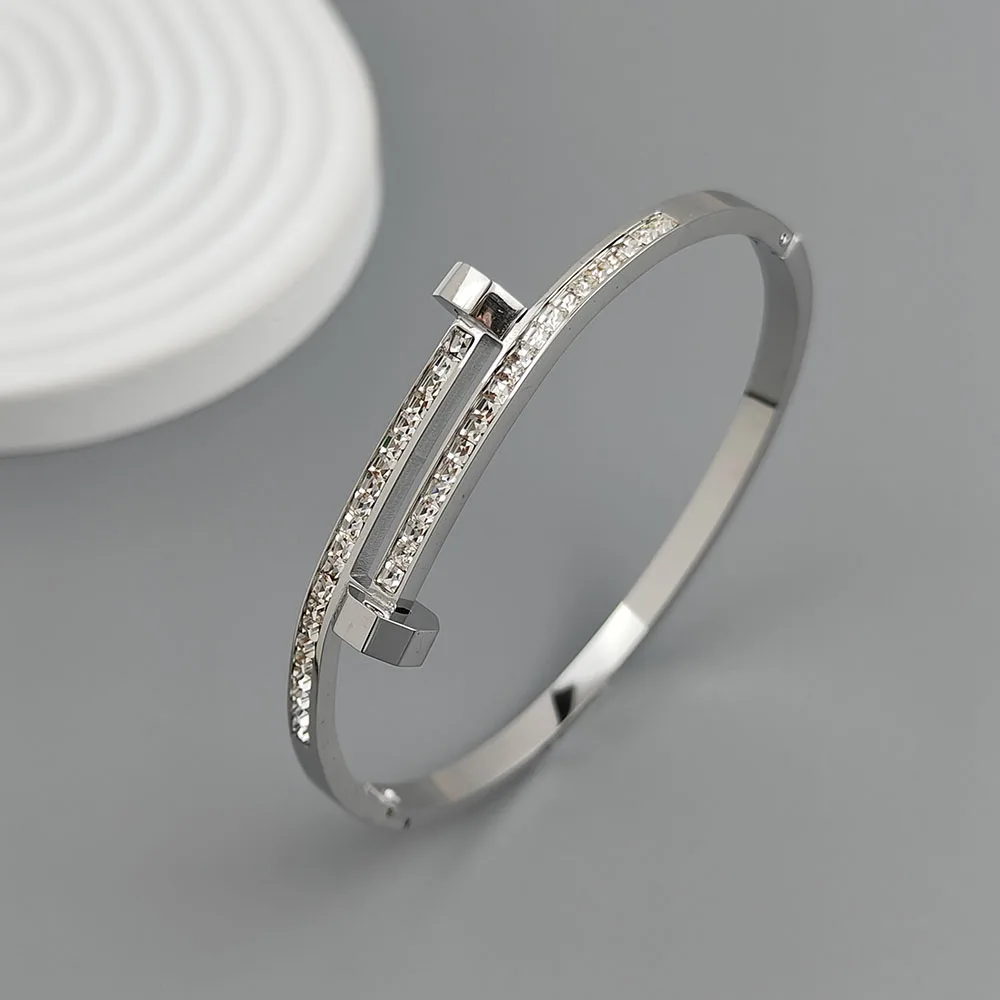 Nueva pulsera chapada en oro de acero inoxidable con circonita para uñas de 18 quilates, pulsera de pareja impermeable de alta calidad, regalo para esposa