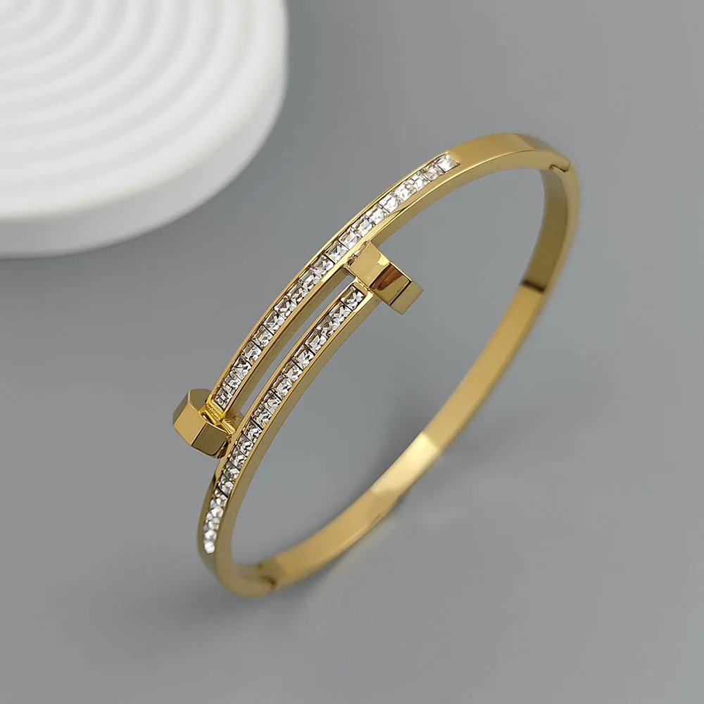 Nueva pulsera chapada en oro de acero inoxidable con circonita para uñas de 18 quilates, pulsera de pareja impermeable de alta calidad, regalo para esposa