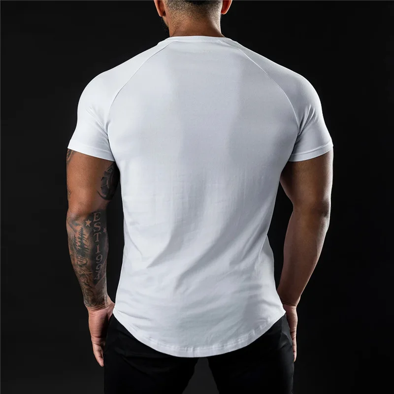 Camiseta lisa de gimnasio para hombre, ropa deportiva de verano, camiseta de manga corta con cuello redondo, camiseta ajustada de algodón, camisetas de entrenamiento para culturismo