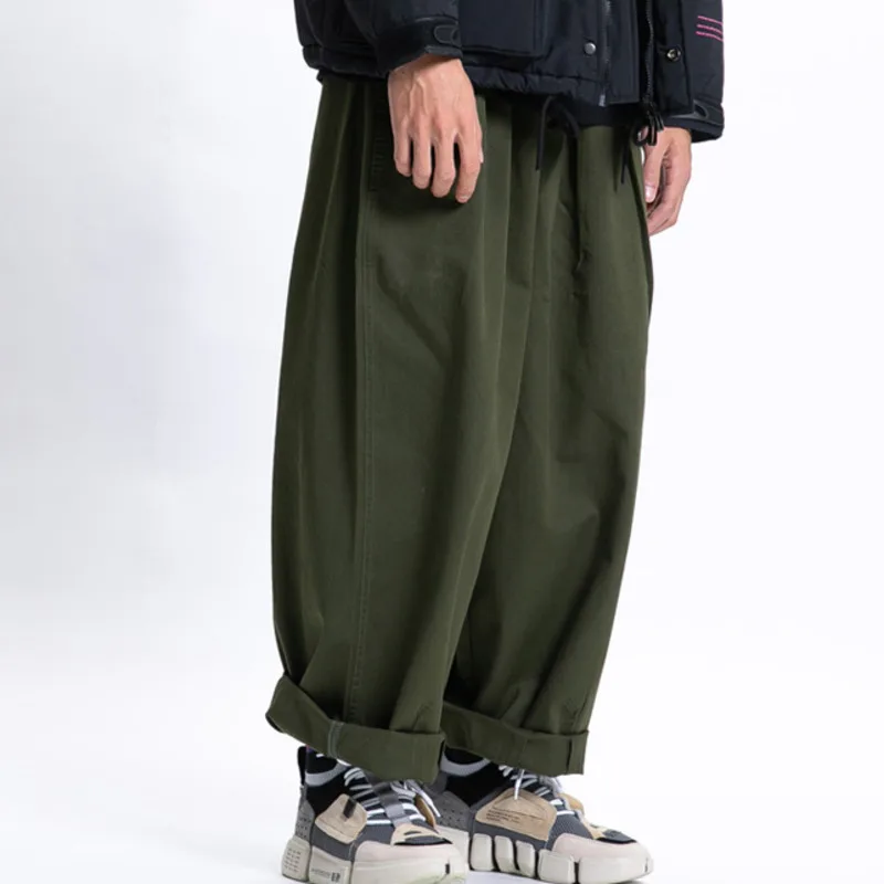 2025 primavera nuevos pantalones casuales Cityboy moda holgada japonesa pantalones de pierna ancha versátiles pantalones de trabajo de Color sólido hombres y mujeres