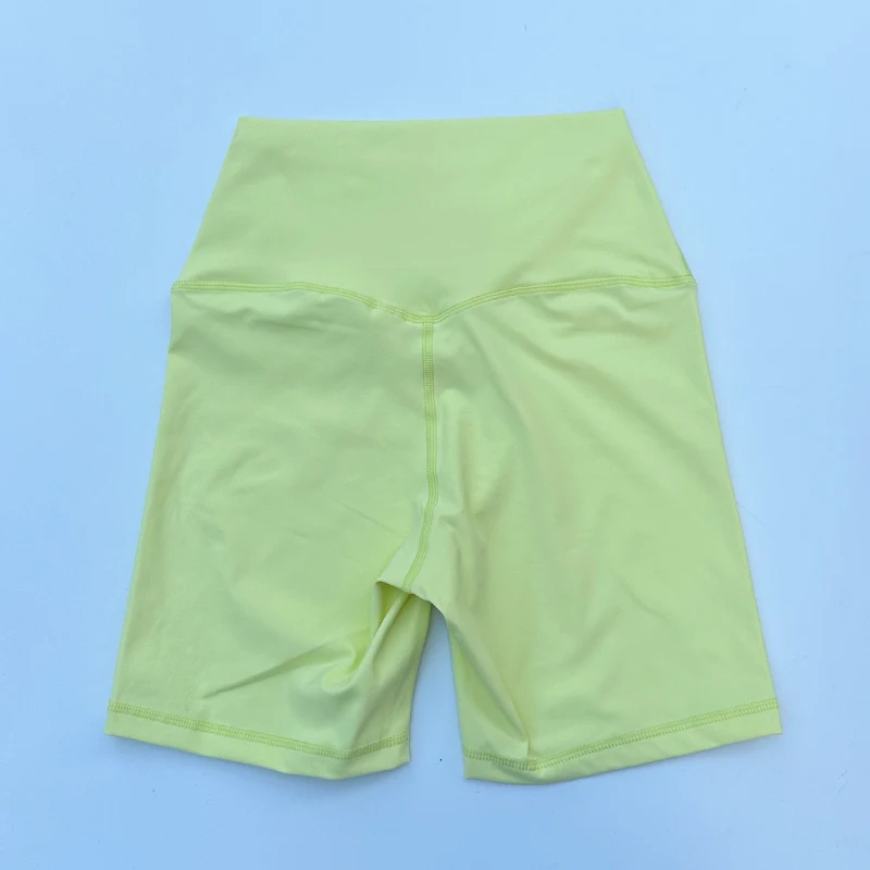 Pantalones cortos deportivos para mujer, pantalones cortos de Yoga de cintura alta, ajustados, levantadores de glúteos, gimnasio, correr, pantalones cortos de nailon de alta elasticidad