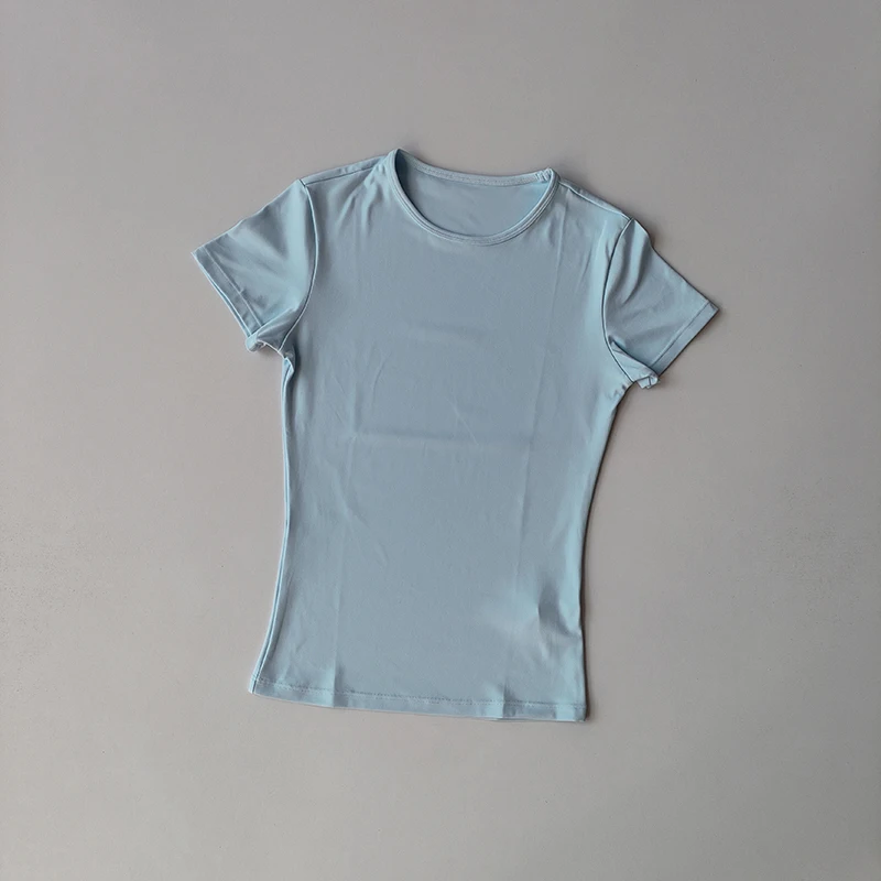 Ropa de Yoga de Color sólido con detección desnuda para mujer, camiseta ajustada elástica de secado rápido de manga corta, ropa deportiva, ropa superior