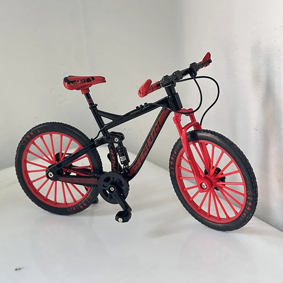 Mini bicicleta de aleación 1:10, modelo fundido a presión, bicicleta de montaña en miniatura de Metal, juguete de carreras, colección de simulación, juguetes para niños
